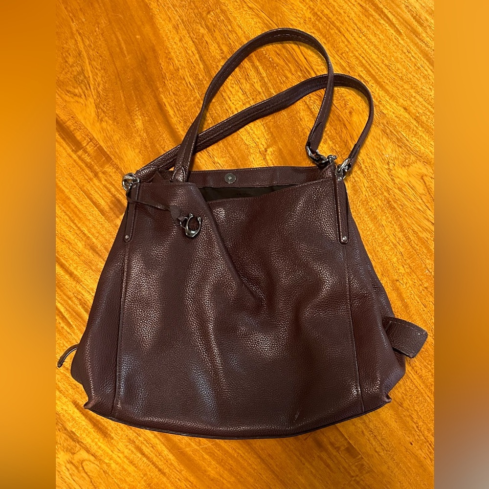 Coach bag SOLD OUT, oxblood color, pebbled leather. Gunmetal hardware.